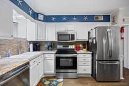 Escape to Windy Village-Oceanfront-Sleep6-2br/2ba-Full Kitchen-Pool-Free Parking